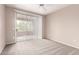 Neutral-toned bedroom with plush carpet and sliding glass doors leading to a balcony at 20100 N 78Th N Pl # 3212, Scottsdale, AZ 85255