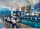 Upscale chef's kitchen with stainless steel appliances, modern lighting, and bar seating for an enjoyable dining experience at 20100 N 78Th N Pl # 3212, Scottsdale, AZ 85255