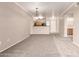 Inviting, open-concept living space featuring carpeted flooring, neutral walls, and connectivity to the kitchen at 20100 N 78Th N Pl # 3212, Scottsdale, AZ 85255