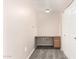 Office space features neutral walls, carpet, a built-in desk, and closet space at 20100 N 78Th N Pl # 3212, Scottsdale, AZ 85255