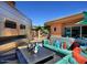Stylish outdoor lounge area features comfortable seating and a modern architectural design under a clear blue sky at 20100 N 78Th N Pl # 3212, Scottsdale, AZ 85255