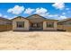 Spacious backyard with block fence and cozy covered patio, perfect for outdoor entertaining at 20606 E Avenida Del Valle Ct, Queen Creek, AZ 85142