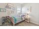 Stylish bedroom with whimsical decor, soft carpet, and bright natural light at 20606 E Avenida Del Valle Ct, Queen Creek, AZ 85142