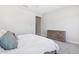 An open and airy bedroom with neutral carpet and white walls at 20606 E Avenida Del Valle Ct, Queen Creek, AZ 85142