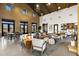 Inviting community lounge featuring cozy seating, stylish decor, and a relaxing atmosphere at 20606 E Avenida Del Valle Ct, Queen Creek, AZ 85142