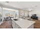Modern kitchen with a large island, open to the dining and living areas, perfect for entertaining and Gathering gatherings at 20606 E Avenida Del Valle Ct, Queen Creek, AZ 85142