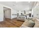 Bright, open-concept living room and kitchen with modern finishes at 20606 E Avenida Del Valle Ct, Queen Creek, AZ 85142