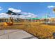 Community playground with modern play equipment and shade structures for outdoor fun at 20606 E Avenida Del Valle Ct, Queen Creek, AZ 85142