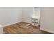 Bedroom features wood floors, window, and cubbies at 20606 E Avenida Del Valle Ct, Queen Creek, AZ 85142
