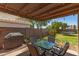 Cozy patio area featuring a glass table and chairs perfect for outdoor dining at 2247 E Ross Ave, Phoenix, AZ 85024