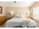 Light and airy bedroom with two lamps and a comfortable bed at 2247 E Ross Ave, Phoenix, AZ 85024