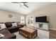 Cozy living room with vaulted ceilings, ceiling fan, and modern decor at 2247 E Ross Ave, Phoenix, AZ 85024