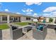 Outdoor living space including an outdoor kitchen and playground set at 22991 E Via De Olivos --, Queen Creek, AZ 85142