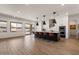 Spacious kitchen with large island, stainless steel appliances and access to the outdoor pool area at 22991 E Via De Olivos --, Queen Creek, AZ 85142