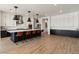 A large kitchen with a center island, sleek countertops, and modern cabinetry, offering ample workspace at 22991 E Via De Olivos --, Queen Creek, AZ 85142