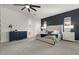 Spacious main bedroom with soft carpet, ceiling fan, and natural light at 22991 E Via De Olivos --, Queen Creek, AZ 85142