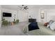Spacious main bedroom with ceiling fan, sitting area, and elegant finishes at 22991 E Via De Olivos --, Queen Creek, AZ 85142