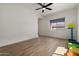 Spacious playroom with natural light, ceiling fan, and colorful seating at 22991 E Via De Olivos --, Queen Creek, AZ 85142