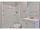 This bathroom features a shower, toilet, and a sink with a mirror above it at 2617 N 40Th Ave, Phoenix, AZ 85009
