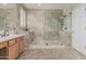 Bathroom featuring walk-in shower with tiled walls at 26249 N 68Th Ln, Peoria, AZ 85383