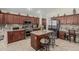 Gourmet kitchen with a large island, stainless steel appliances, and granite countertops at 26249 N 68Th Ln, Peoria, AZ 85383