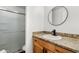 Modern bathroom with granite countertop, stylish faucet, and glass-enclosed shower at 2650 W Union Hills Dr # 100, Phoenix, AZ 85027