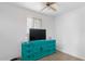Cozy bedroom with a blue dresser and neutral carpeting at 2650 W Union Hills Dr # 100, Phoenix, AZ 85027