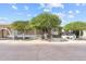 Charming single-story home featuring mature shade trees and accessible ramp, showcasing curb appeal at 2650 W Union Hills Dr # 100, Phoenix, AZ 85027