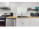 Kitchen featuring butcher block countertops, stainless steel appliances, and modern fixtures at 2650 W Union Hills Dr # 100, Phoenix, AZ 85027