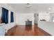 Open living room boasts hardwood floors, lots of natural light, and contemporary decor at 2650 W Union Hills Dr # 100, Phoenix, AZ 85027