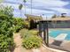 Backyard pool with diving board and desert landscaping at 2749 S Rita Ln, Tempe, AZ 85282