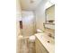 Compact bathroom featuring a glass-enclosed shower and a single sink at 2749 S Rita Ln, Tempe, AZ 85282