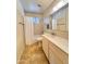 Clean bathroom featuring a shower, vanity, and window at 2749 S Rita Ln, Tempe, AZ 85282