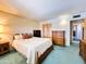 Traditional bedroom featuring a queen bed and rich, wood-toned furniture at 2749 S Rita Ln, Tempe, AZ 85282