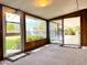 Relaxing sunroom with sliding glass doors overlooking a beautiful pool and backyard at 2749 S Rita Ln, Tempe, AZ 85282