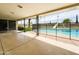 Inviting backyard pool with a safety fence and slide, surrounded by lush greenery at 2749 S Rita Ln, Tempe, AZ 85282