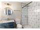 The bathroom offers a vanity with modern fixtures and a tiled shower at 2914 W Marlette Ave, Phoenix, AZ 85017