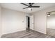 The bedroom has stylish gray vinyl floors, closet, and a door to another room at 2914 W Marlette Ave, Phoenix, AZ 85017
