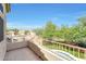 Second story balcony overlooks the backyard featuring a pool and mature landscaping at 31227 N 45Th St, Cave Creek, AZ 85331
