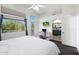 Bright main bedroom features vaulted ceilings, a door to the backyard, and an ensuite bath at 31227 N 45Th St, Cave Creek, AZ 85331
