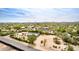 Wide angle aerial view of a home and surrounding area in a desert environment with mountain views at 33852 N 52Nd St, Cave Creek, AZ 85331