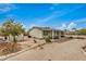 View of the back of house with large covered patio at 33852 N 52Nd St, Cave Creek, AZ 85331
