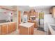 Kitchen featuring tile countertops, matching cabinetry, and an island at 33852 N 52Nd St, Cave Creek, AZ 85331