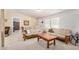 Bright living room features neutral carpet and paint and large windows at 33852 N 52Nd St, Cave Creek, AZ 85331