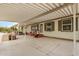 Wide, covered patio with outdoor furniture, ideal for relaxation and entertainment at 33852 N 52Nd St, Cave Creek, AZ 85331