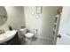 Bathroom featuring a modern vanity with stylish decor and neutral colored walls at 3402 N 300Th Dr, Buckeye, AZ 85396