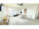 Spacious living room with carpet, modern furniture, and natural light at 3402 N 300Th Dr, Buckeye, AZ 85396