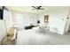 Large, well-lit living room with plush carpet, contemporary furnishings and nice decor at 3402 N 300Th Dr, Buckeye, AZ 85396