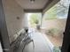 Charming patio with a small table and chairs, perfect for outdoor relaxation at 3402 N 300Th Dr, Buckeye, AZ 85396