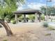 Community picnic area with a shaded shelter and picnic tables for outdoor enjoyment at 3402 N 300Th Dr, Buckeye, AZ 85396